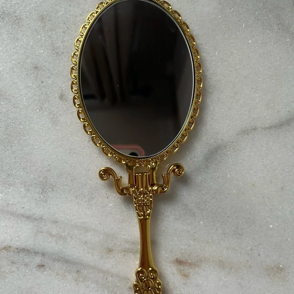 Izzy and Liv gold Fold Away Hand Mirror adjustable
